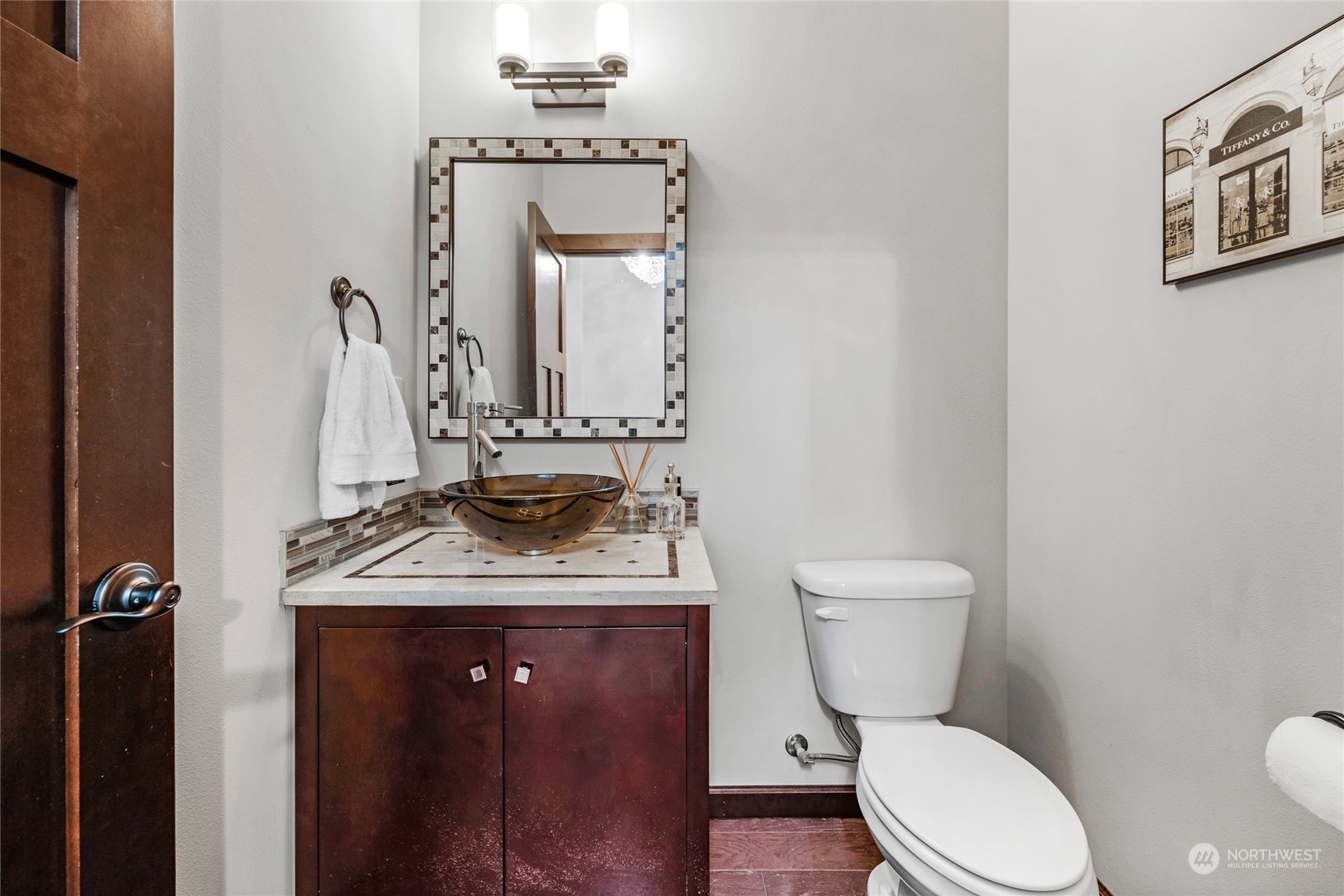 7521 Broadway Everett, WA 98203 - Photo 18 of 25 a bathroom with a granite countertop toilet sink and mirror