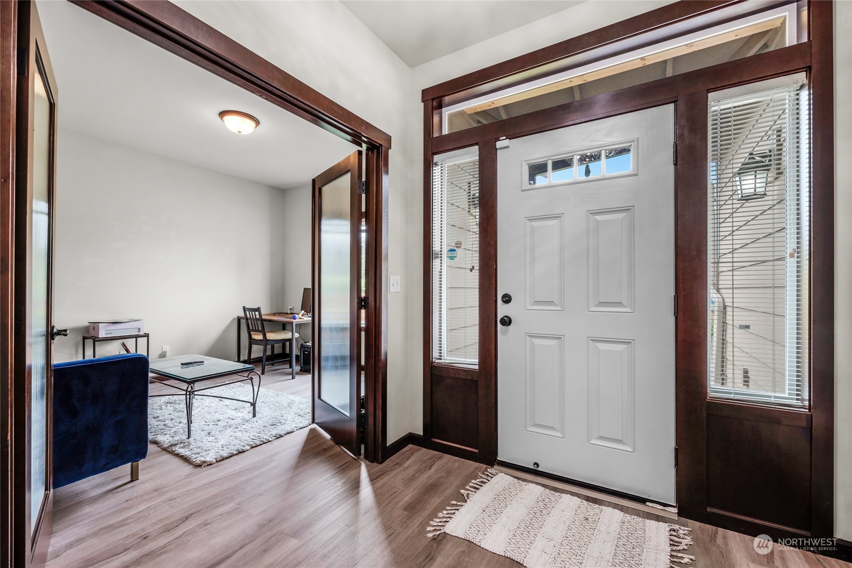 7521 Broadway Everett, WA 98203 - Photo 2 of 25 a view of a livingroom with furniture and hardwood floor