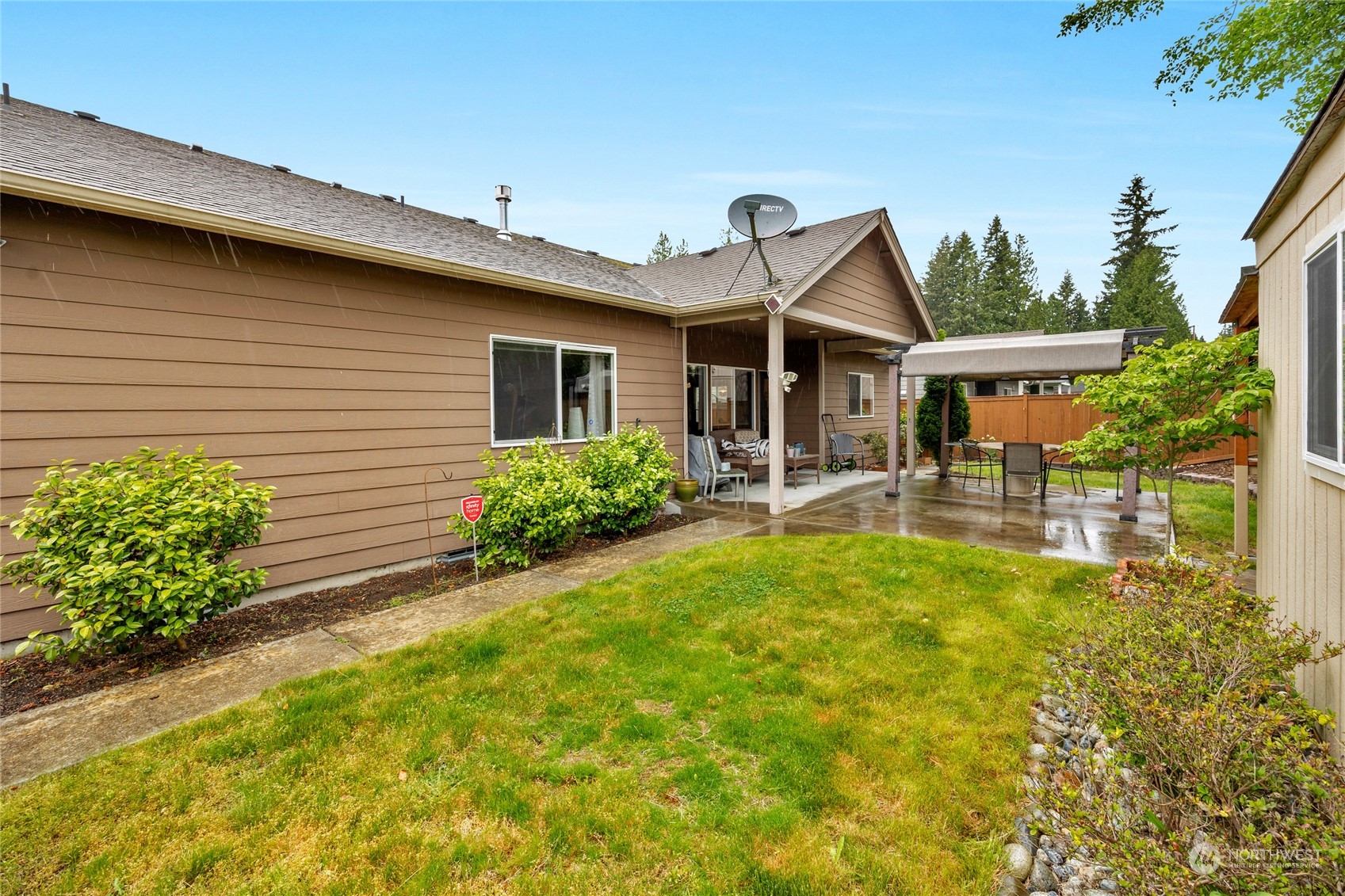 7521 Broadway Everett, WA 98203 - Photo 24 of 25 a front view of house with yard and outdoor seating