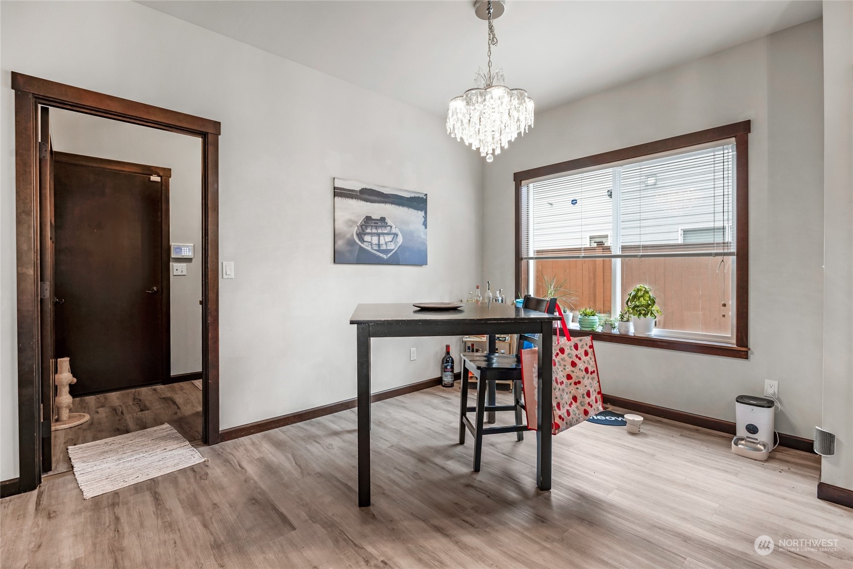 7521 Broadway Everett, WA 98203 - Photo 8 of 25 a view of a dining room with furniture window and wooden floor