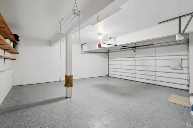 a backyard of a house with outdoor seating