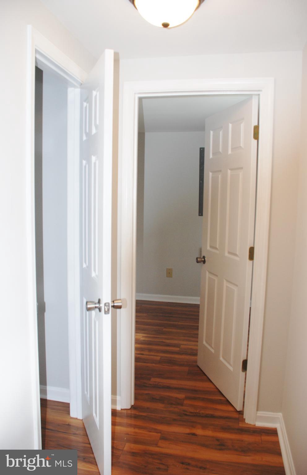 321 Spring Street Culpeper, VA 22701 - Photo 32 of 50 Door to lower level BR 3 and closet door