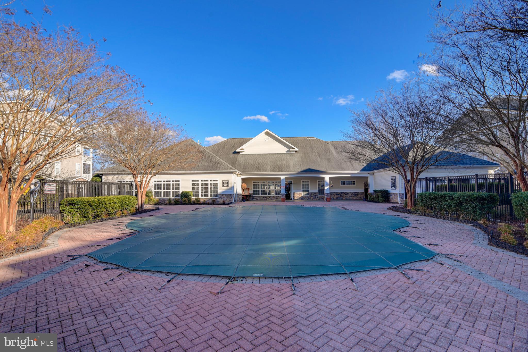 514 Sunset View Terrace Southeast, Unit 103 Leesburg, VA 20175 - Photo 16 of 23 POOL & CLUBHOUSE