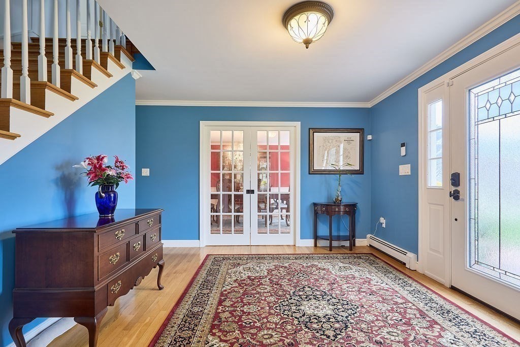 58 Buttercup Lane Hanover, MA 02339 - Photo 5 of 35 a view of livingroom with furniture and a window