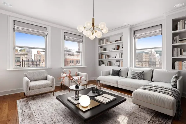 a kitchen with a sink appliances and cabinets