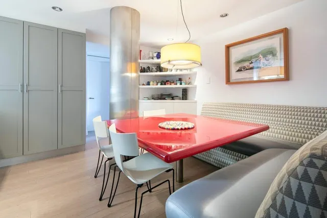 a view of a living room and entryway