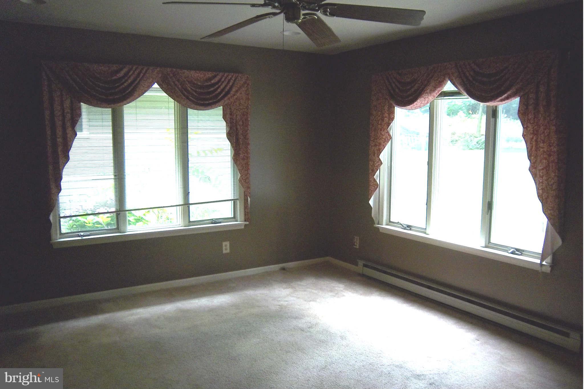 7749 Talhelm Road Chambersburg, PA 17202 - Photo 9 of 26 a view of room with a large window
