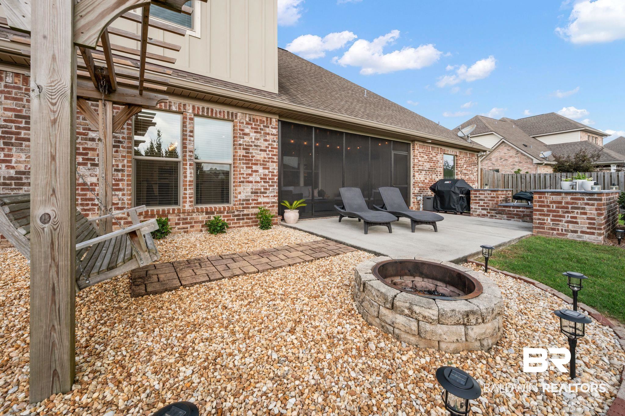 418 Fortune Drive Fairhope, AL 36532 - Photo 44 of 63 Exterior space featuring a fire pit and a grill