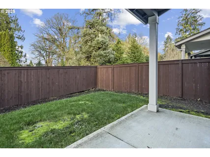 a view of backyard with green space