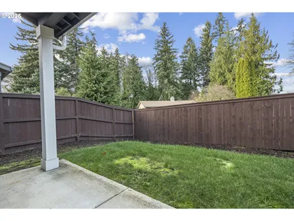 a view of backyard with green space