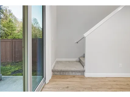 a view of entryway with wooden floor