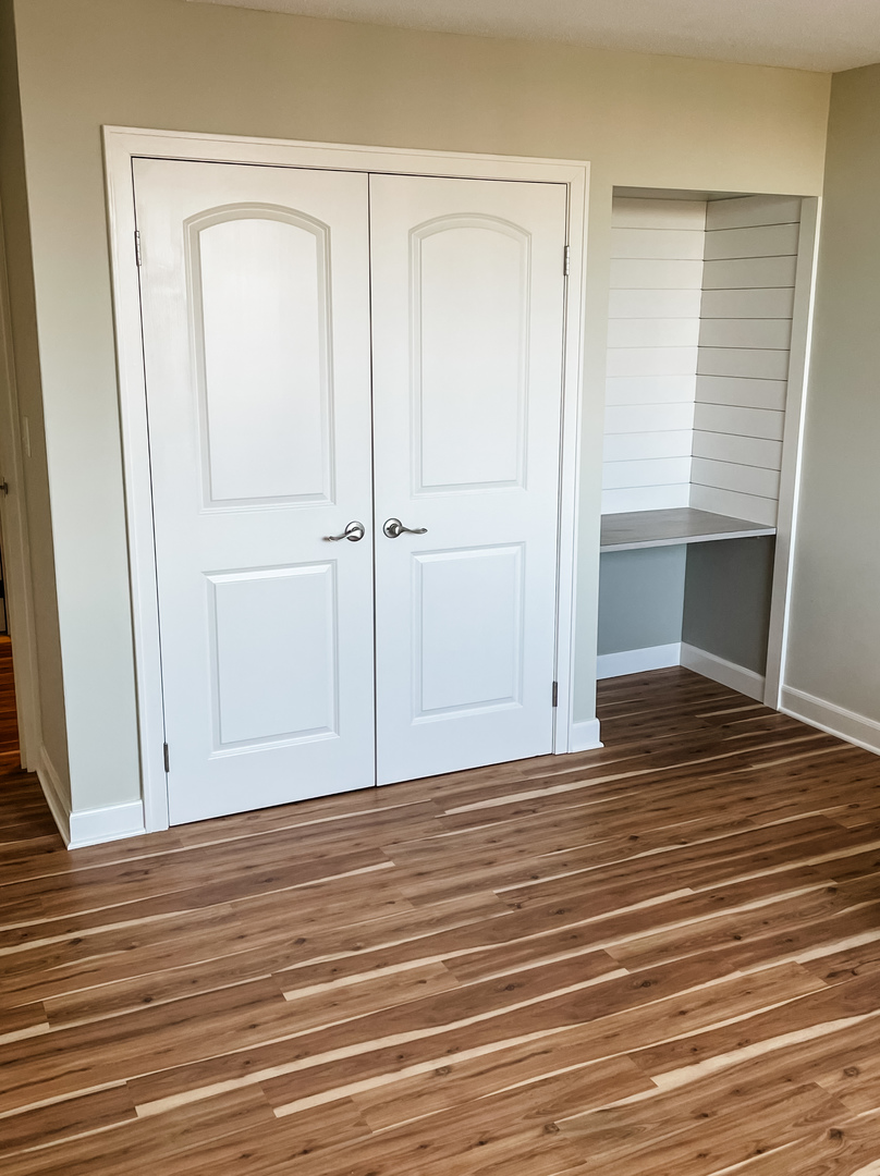 2211 South Highland Avenue, Unit 3E Lombard, IL 60148 - Photo 24 of 25 a view of a room with wooden floor