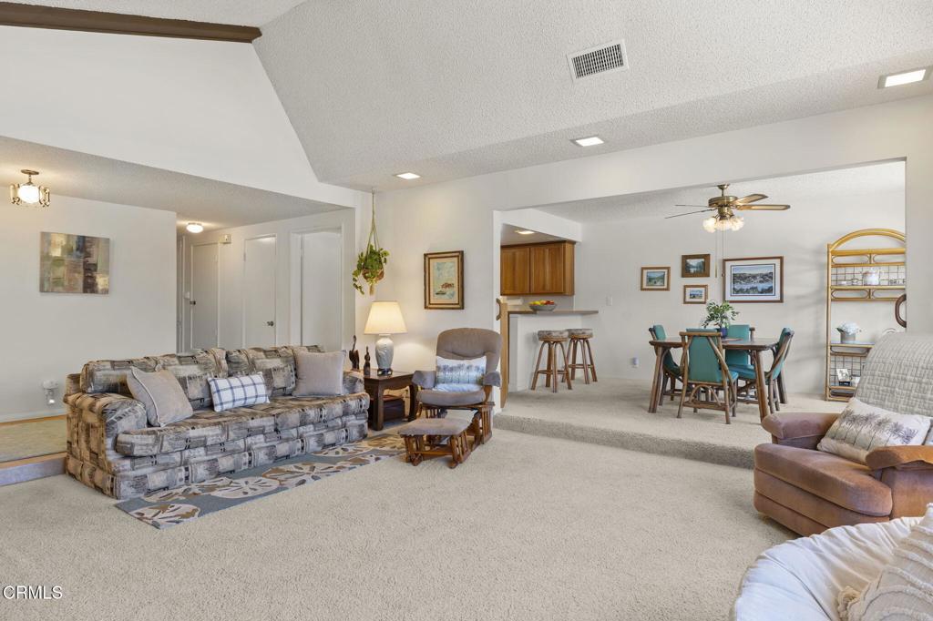 4907 Island View Street Oxnard, CA 93035 - Photo 14 of 44 a living room with furniture and a flat screen tv