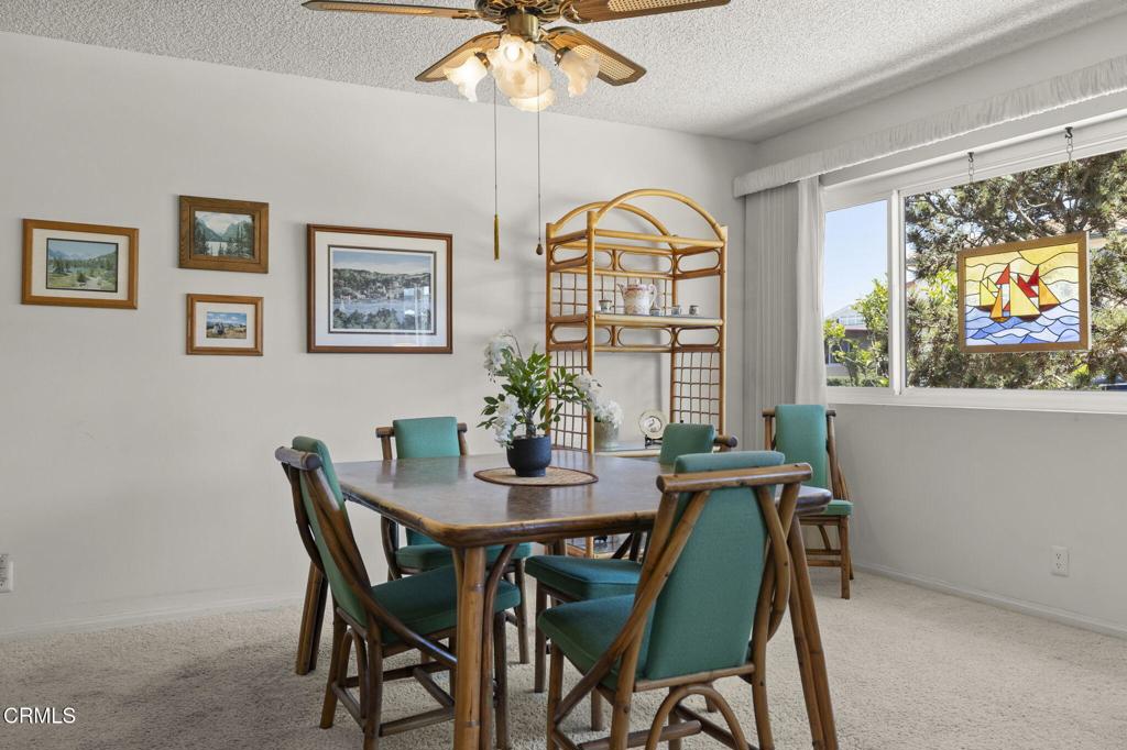 4907 Island View Street Oxnard, CA 93035 - Photo 17 of 44 a view of a dining room with furniture window and outside view