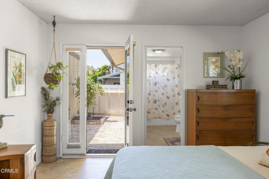 4907 Island View Street Oxnard, CA 93035 - Photo 24 of 44 a bedroom with a bed and a dresser