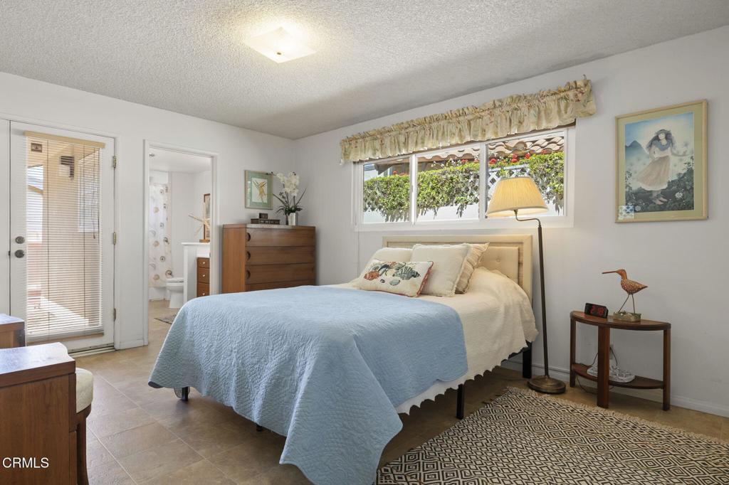4907 Island View Street Oxnard, CA 93035 - Photo 25 of 44 a bedroom with a bed and a window