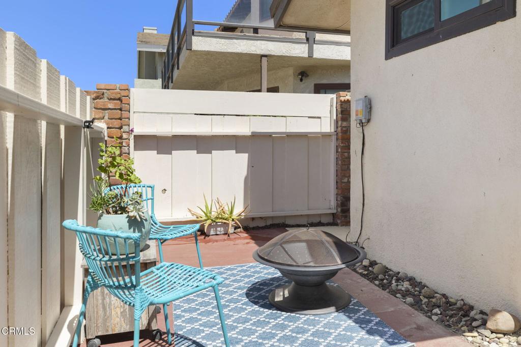 4907 Island View Street Oxnard, CA 93035 - Photo 35 of 44 a bench sitting in front of a building