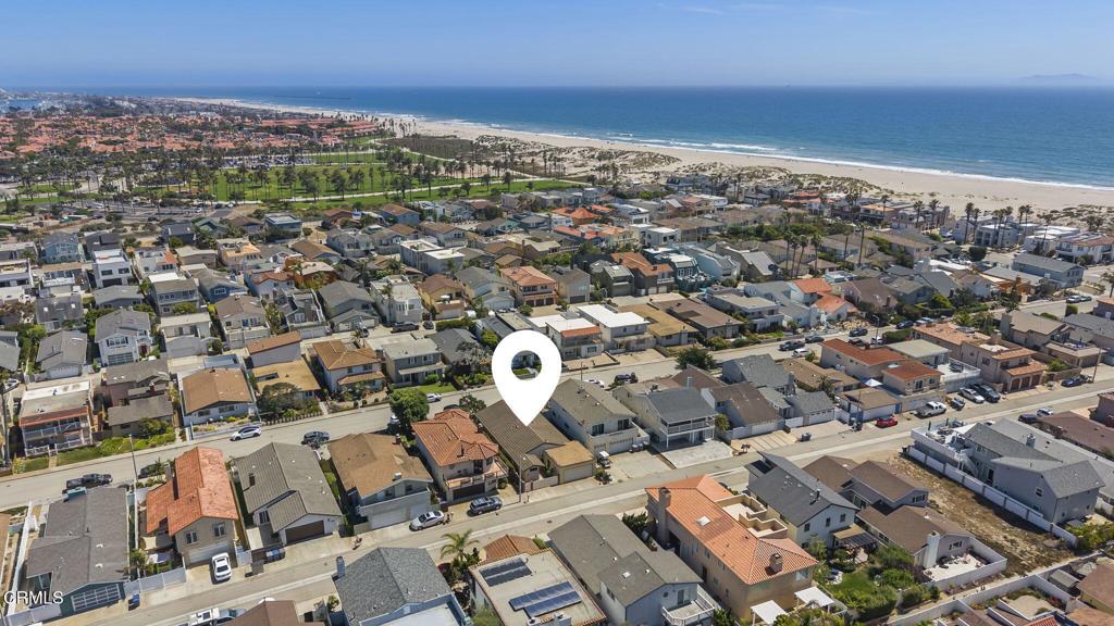 4907 Island View Street Oxnard, CA 93035 - Photo 41 of 44 an aerial view of a city with lots of residential buildings
