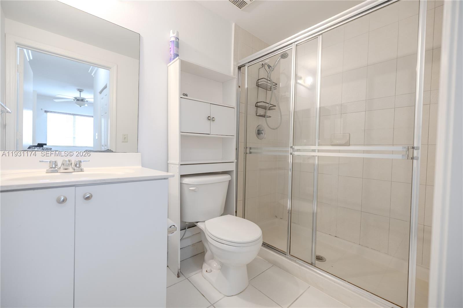 11050 Southwest 196th Street, Unit 305 Cutler Bay, FL 33157 - Photo 11 of 22 a bathroom with a shower toilet and sink