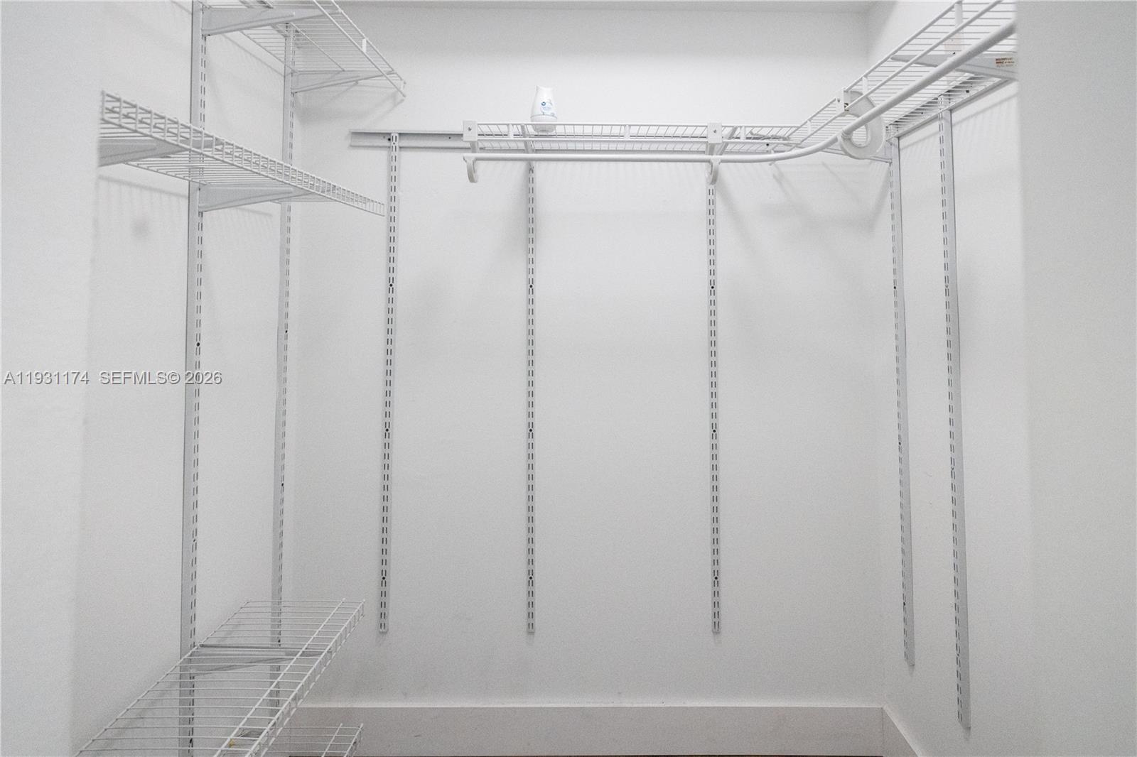 11050 Southwest 196th Street, Unit 305 Cutler Bay, FL 33157 - Photo 13 of 22 a bathroom with a glass shower door