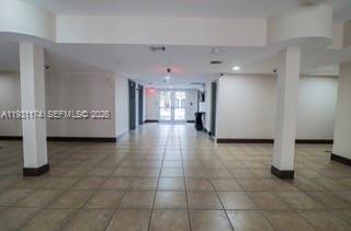 11050 Southwest 196th Street, Unit 305 Cutler Bay, FL 33157 - Photo 14 of 22 a view of a hallway with a living room
