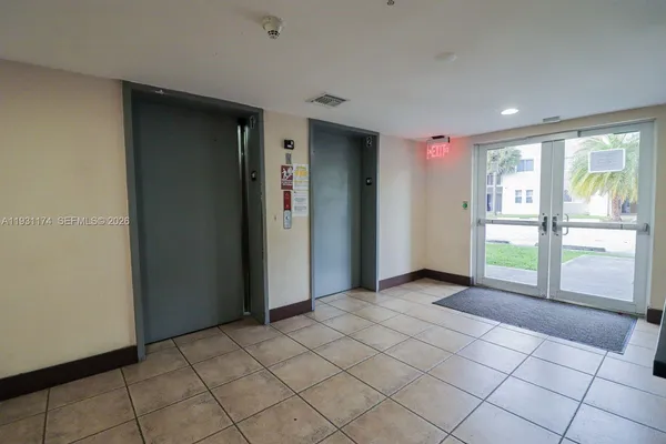 a view of an empty room and window