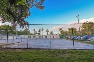 11050 Southwest 196th Street, Unit 305 Cutler Bay, FL 33157 - Photo 20 of 22 a view of a backyard