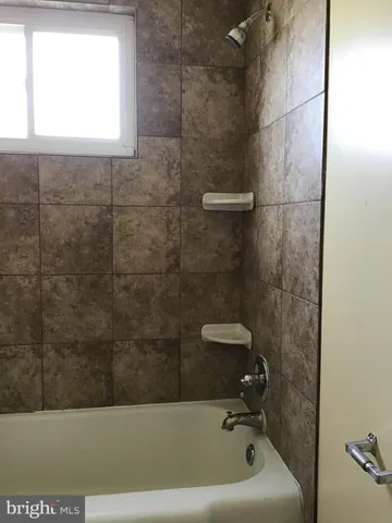 a view of a room with rack on the wall