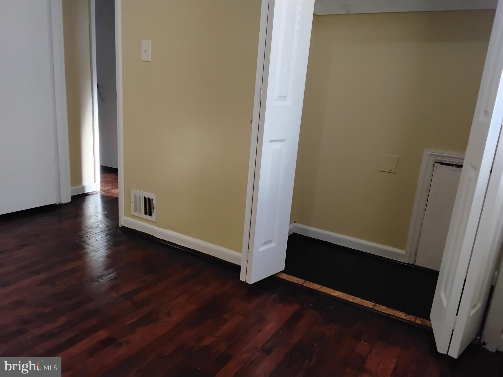 3867 26th Avenue Temple Hills, MD 20748 - Photo 21 of 27 an empty room with wooden floor