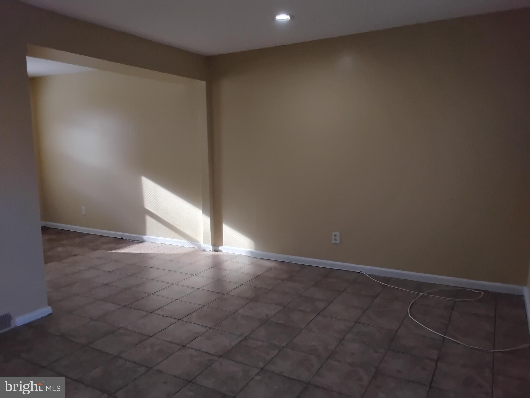 3867 26th Avenue Temple Hills, MD 20748 - Photo 4 of 27 a view of an empty room