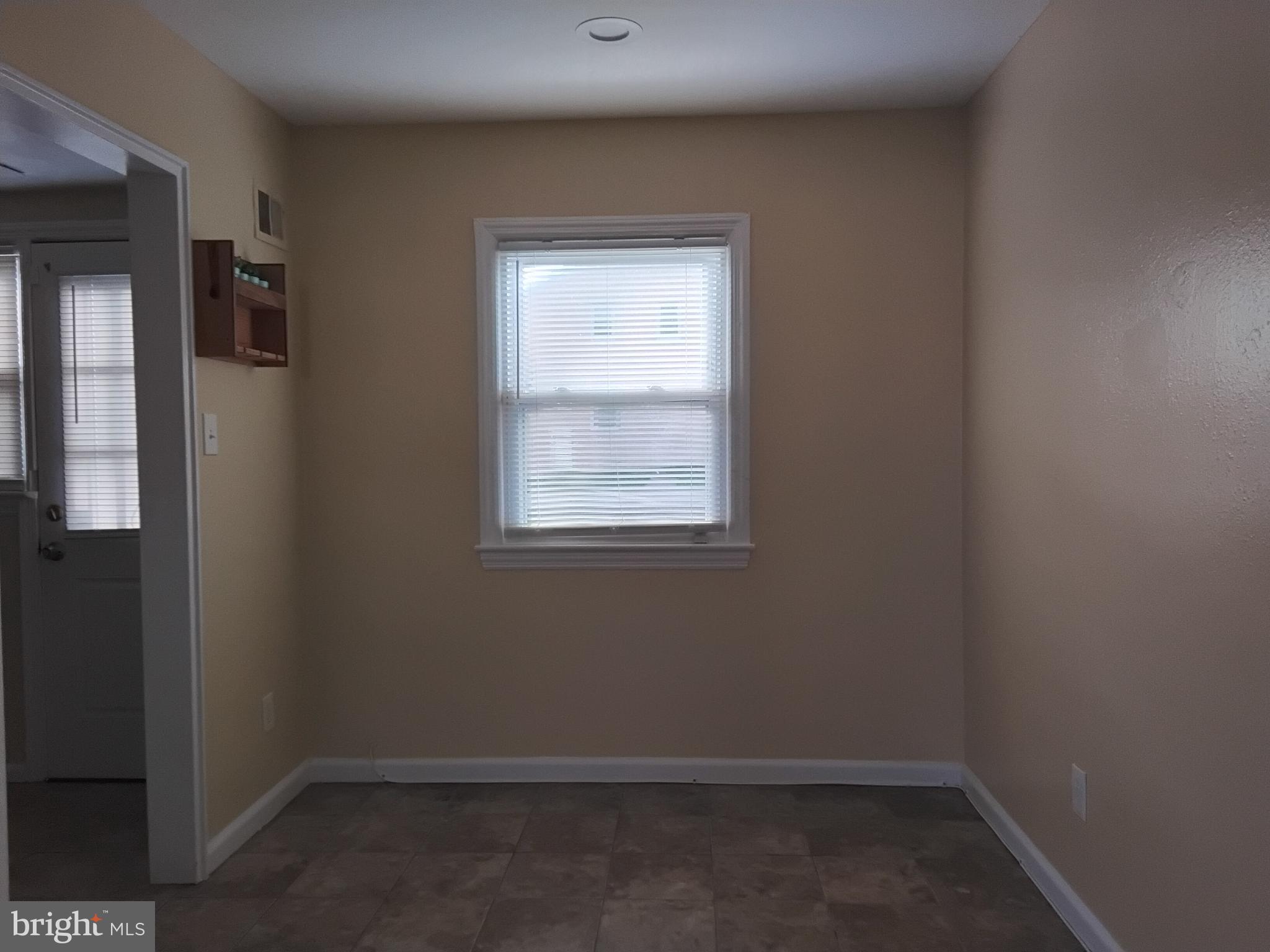 3867 26th Avenue Temple Hills, MD 20748 - Photo 5 of 27 an empty room with a window