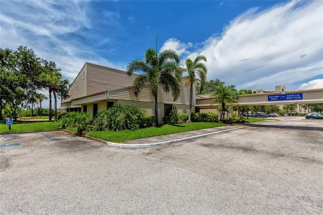 a view of swimming pool with outdoor seating