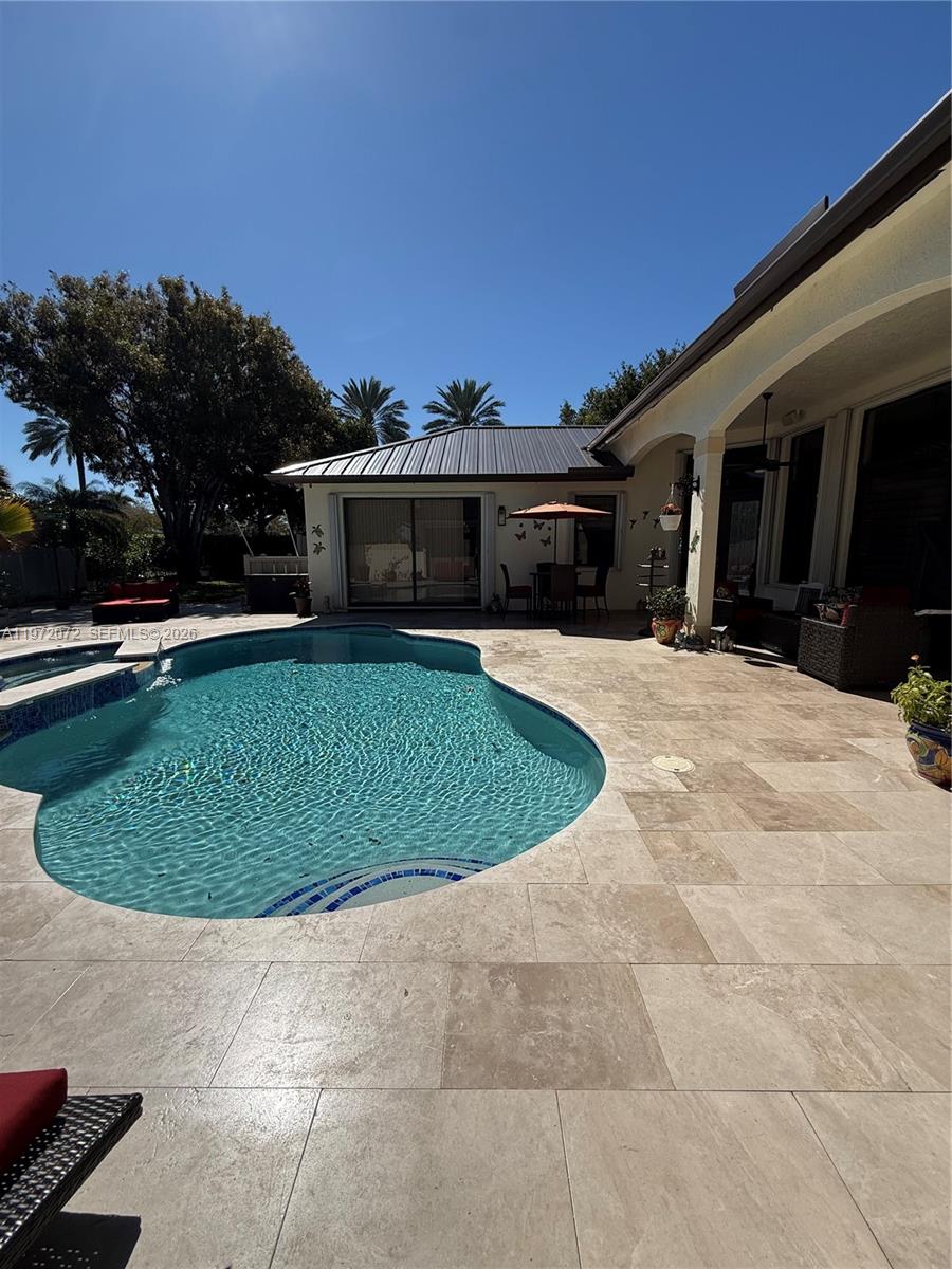 18610 Southwest 39th Court Miramar, FL 33029 - Photo 22 of 32 a view of a house with a backyard