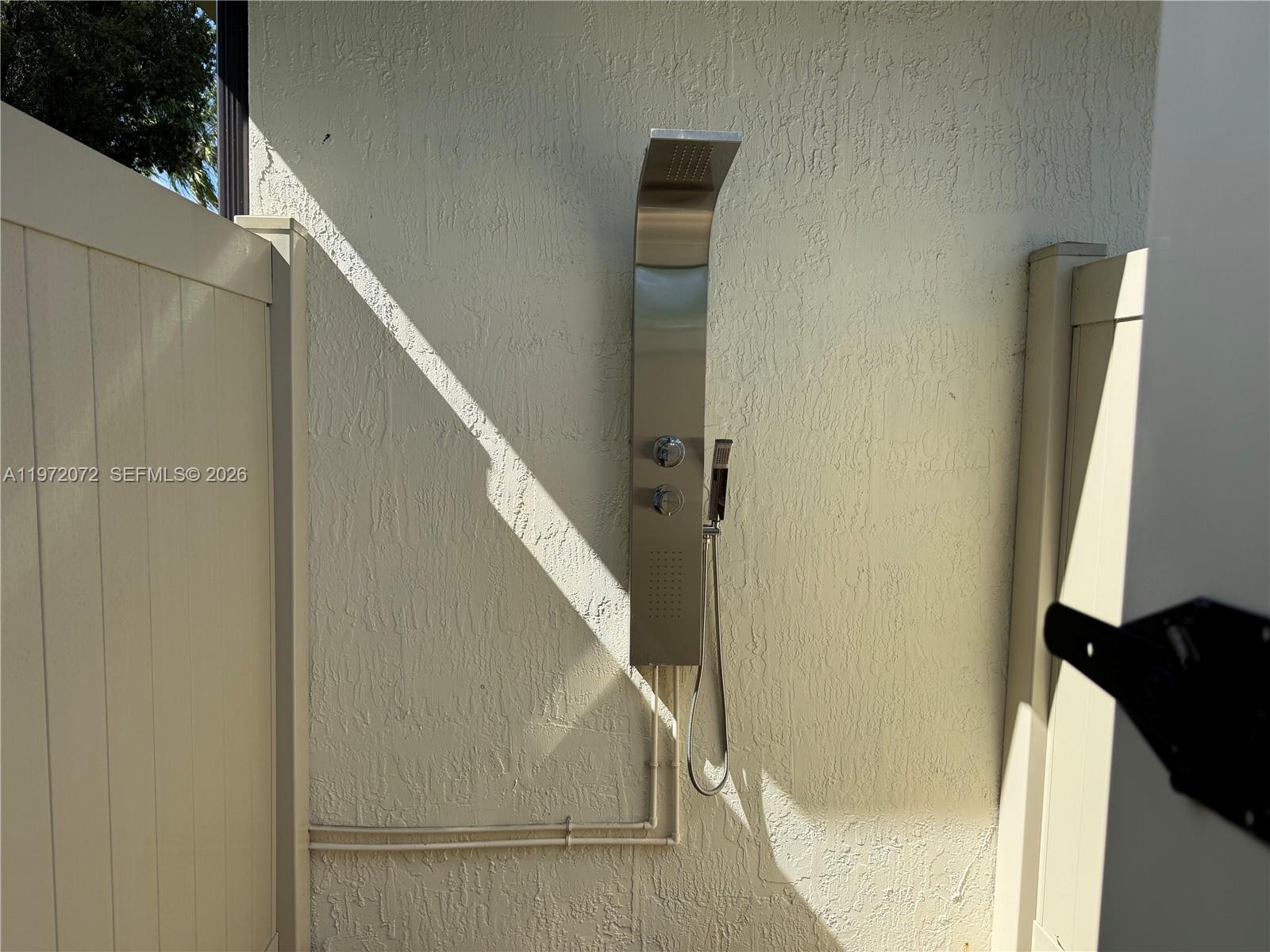 18610 Southwest 39th Court Miramar, FL 33029 - Photo 31 of 32 outside pool shower