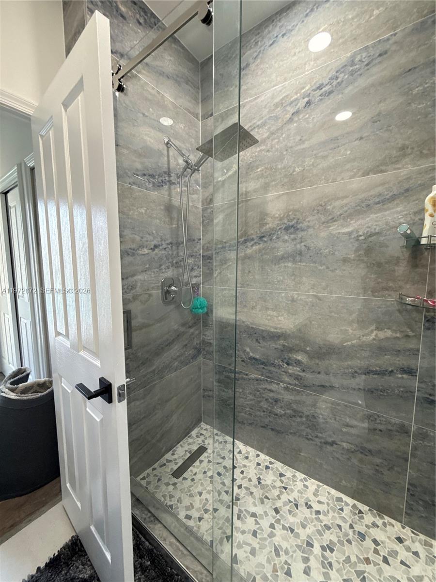 18610 Southwest 39th Court Miramar, FL 33029 - Photo 32 of 32 a bathroom with a shower