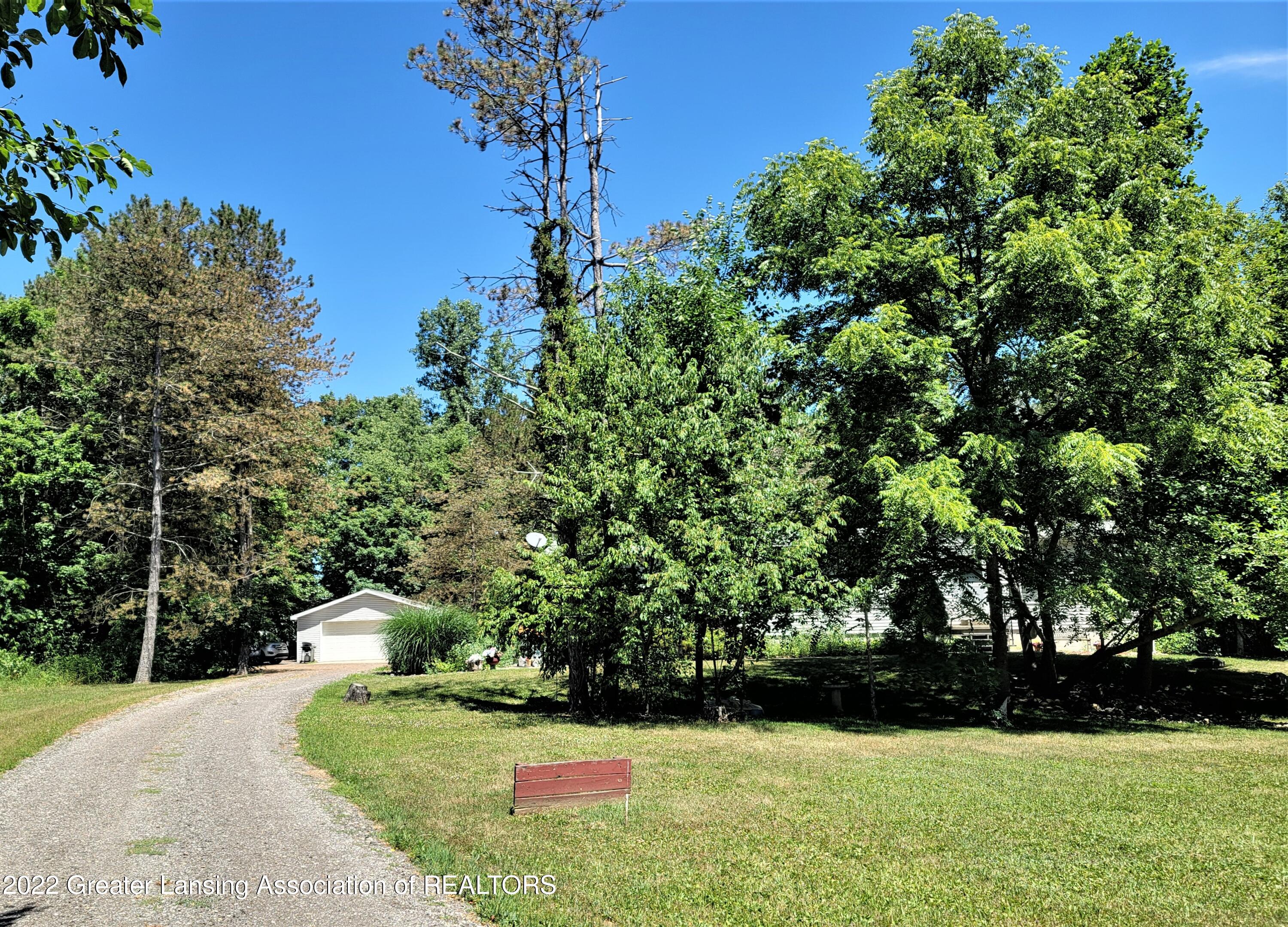 667 Lansing Road Morrice, MI 48857 - Photo 1 of 28 667 E Lansing Rd front 2