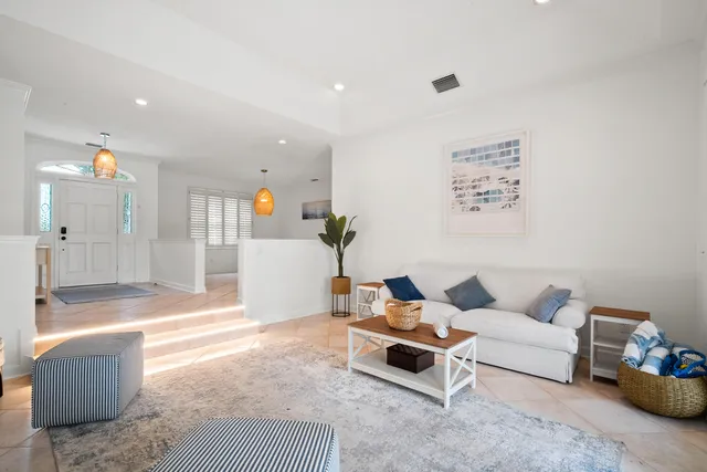 a spacious bedroom with a bed and a table