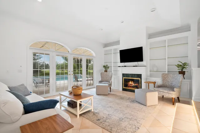 a bathroom with double sink and a mirror