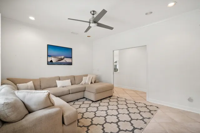 a bedroom with a bed and a chair