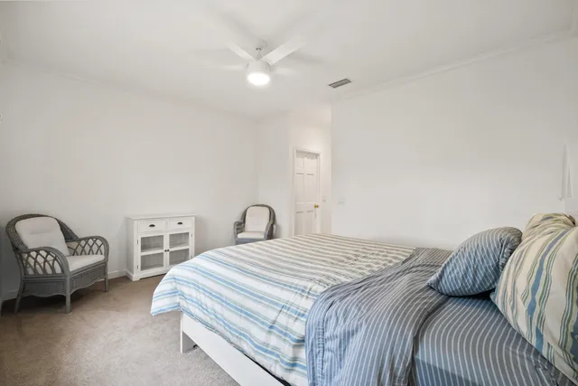 a bathroom with a sink toilet and mirror