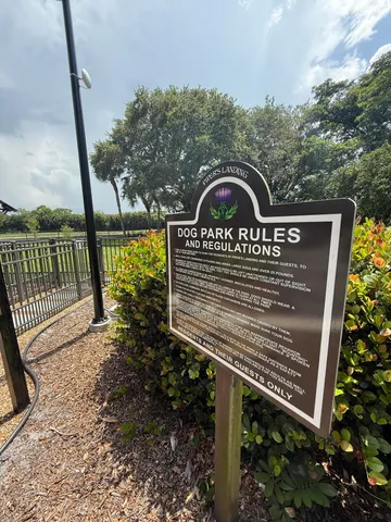 a view of a golf course with a lake