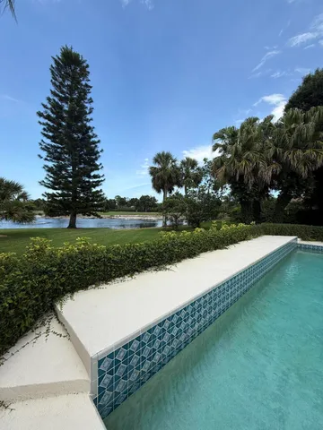 a view of a lake with a yard