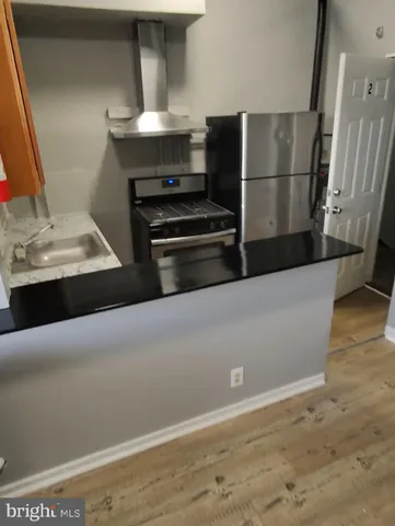 a utility room with a washing machine