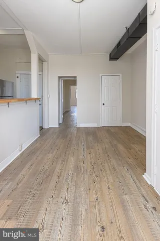 a bathroom with a toilet and a bathtub