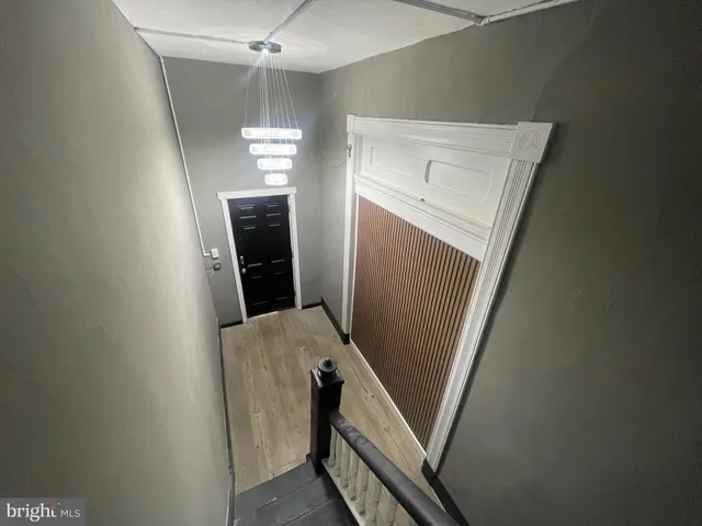 a view of washer and dryer with kitchen countertops