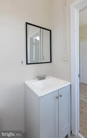 a kitchen with a refrigerator and microwave