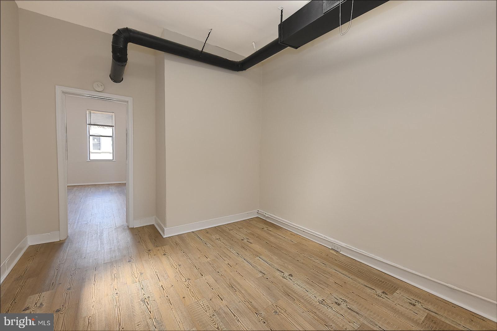 1908 McCulloh Street Baltimore, MD 21217 - Photo 35 of 40 wooden floor in an empty room