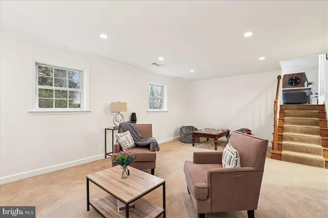 a kitchen with a sink cabinets and window