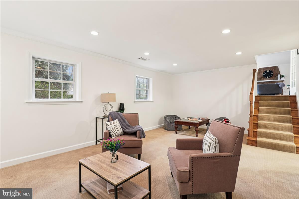 12145 Stirrup Road Reston, VA 20191 - Photo 18 of 80 a living room with furniture and a window
