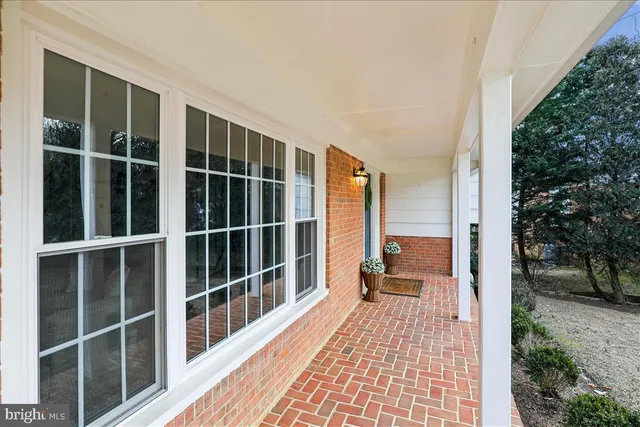 a view of a balcony with wooden floor